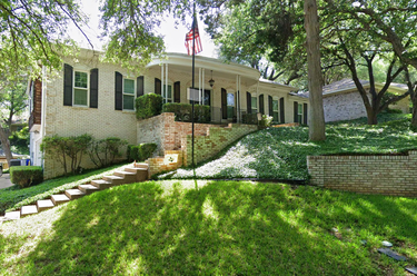 Hills and landscaping can impact exterior painting cost.